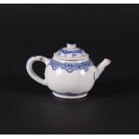 A porcelain small model teapot, with cloud motifs on the teapot and lid. China Kangxi/Yongzheng.