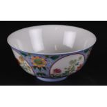 A porcelain Famile Rose bowl, marked Daoguang. China, 20th century.