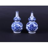 A set of porcelain nodule vases with floral decor in flower beds. China, Kanxi.