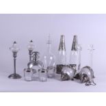 A diverse lot including lanterns, oil lamps and decanters.