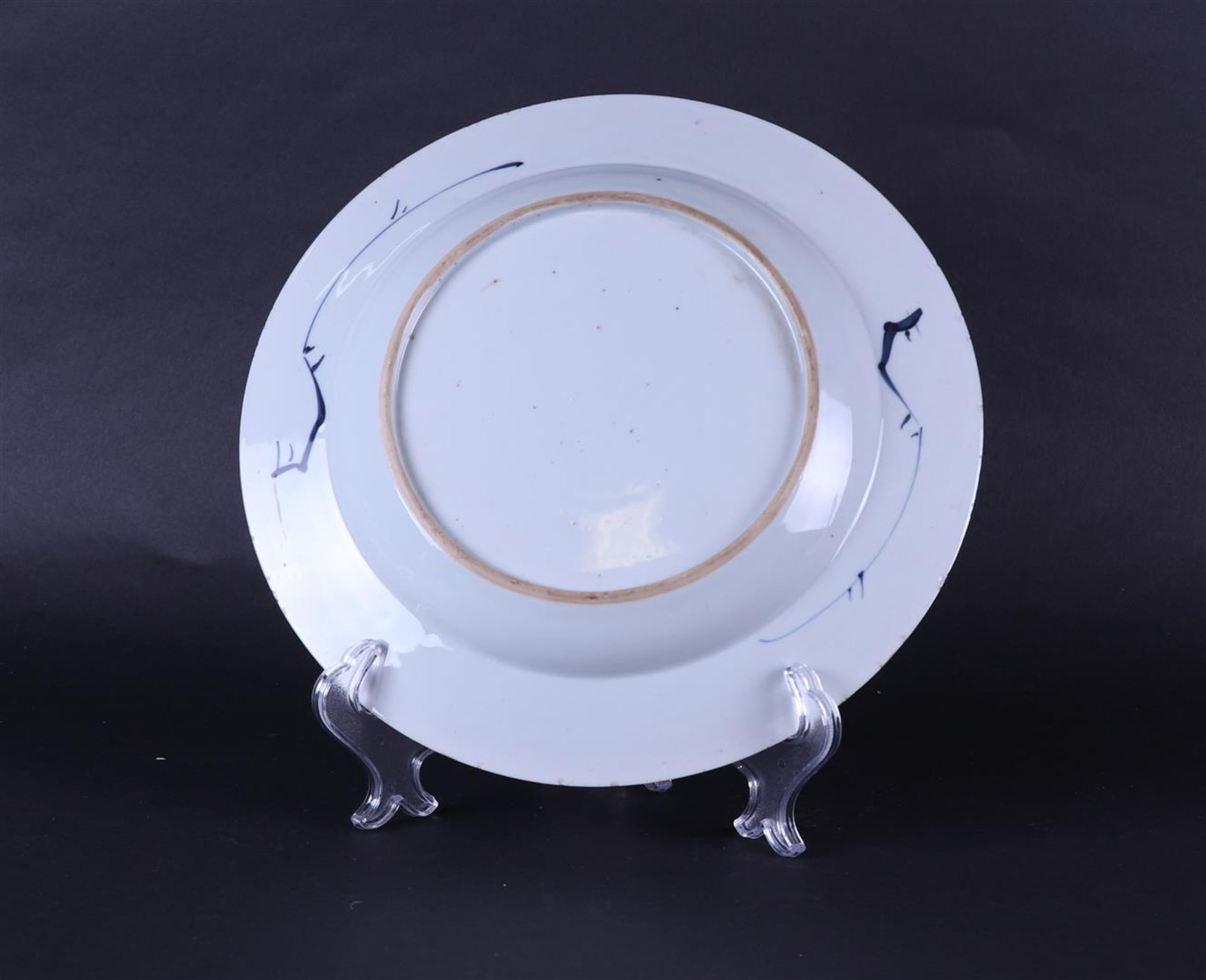 A porcelain dish with floral decoration in the center and with a diamond/box outer edge.  - Image 2 of 2