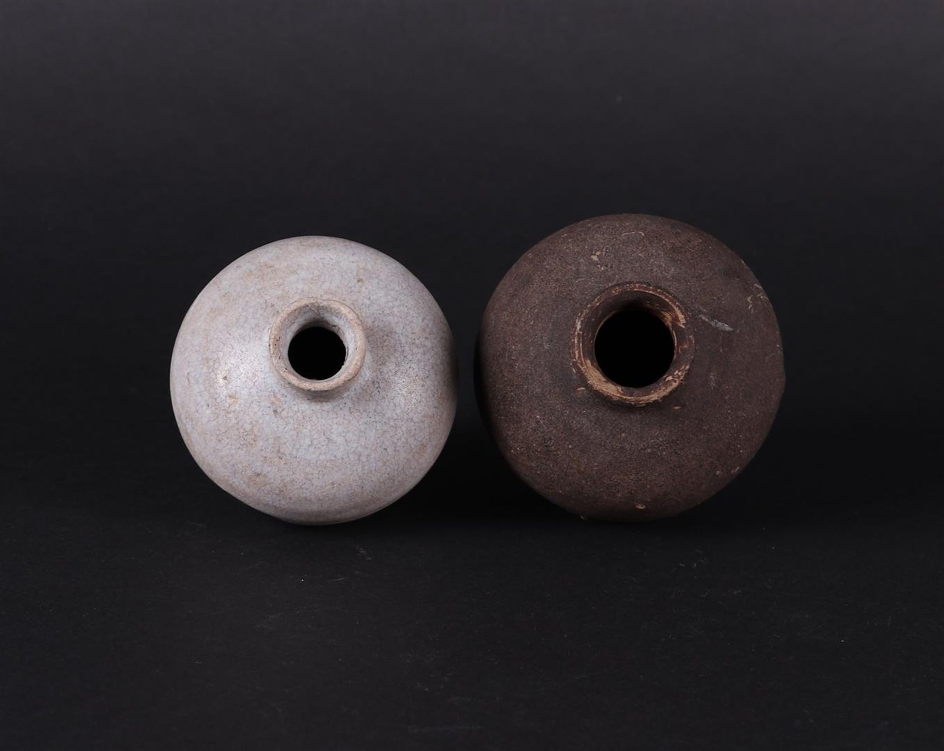A set of stoneware storage jars. One grey, the other dark grey. China  early Ming. - Image 2 of 3