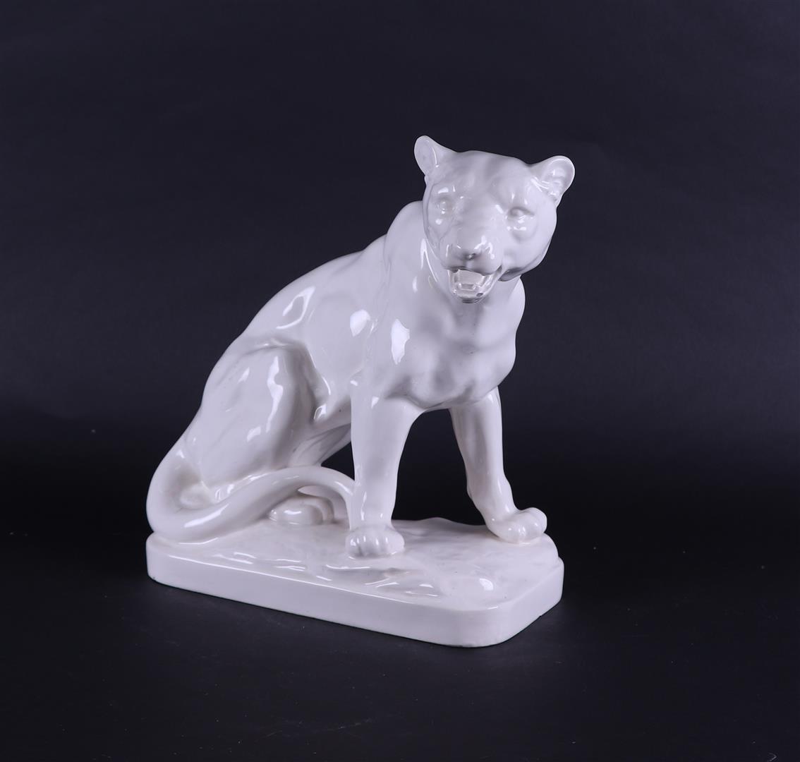 A white pottery "Art Deco" cast piece of a lioness. Germany(?), early 20th century.