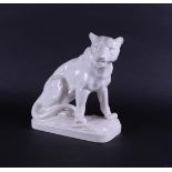 A white pottery "Art Deco" cast piece of a lioness. Germany(?), early 20th century.