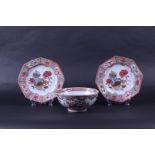 A Famile Rose lot consisting of a bowl and two plates, China, 18th century.