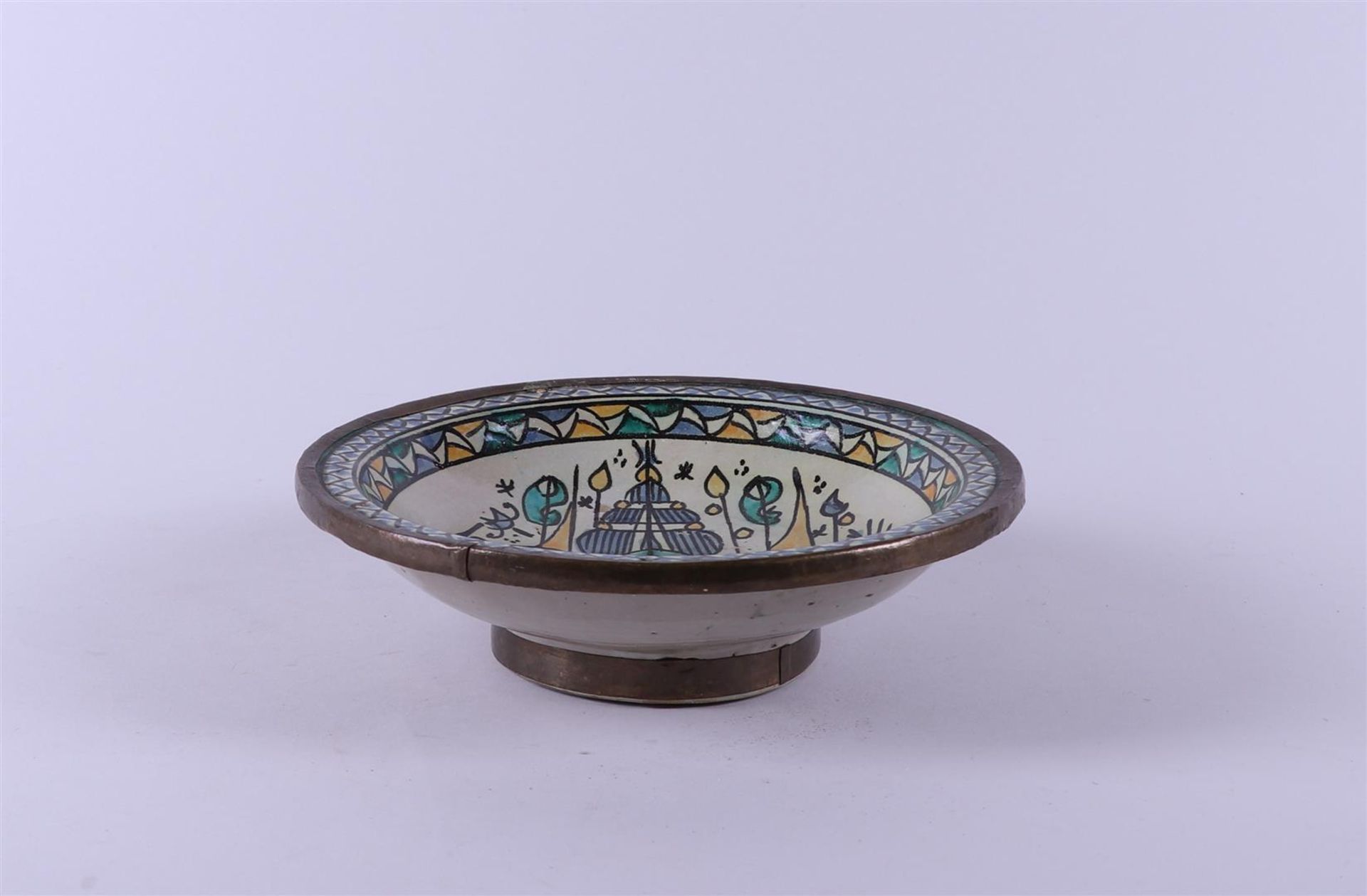 A Moroccan earthenware dish depicting a ship. Fes, Morocco,