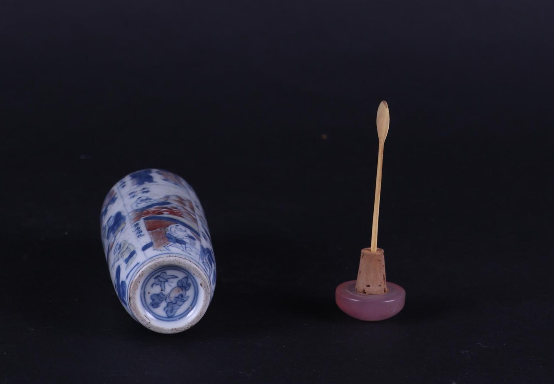 A porcelain snuff bottle with a narrative decor of figures and Chinese text in each compartment.  - Image 3 of 3