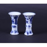 A set of beaker vases decorated with lises and fools, marked Yu (jade). China, Kanxi.
