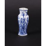 A porcelain shoulder vase 4-pass shaped lobed with rich flower/rock decoration in 4x beds.