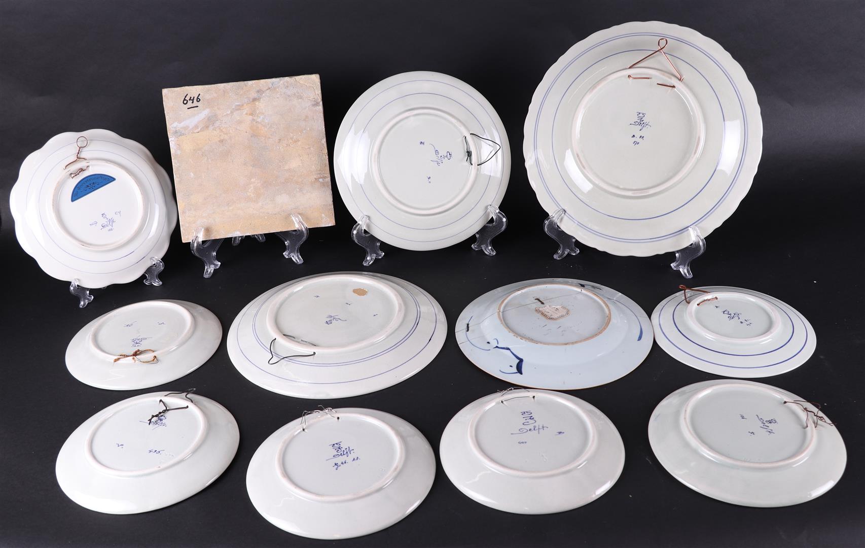 A lot  with (10) various pottery plates, all marked: "De Porselyne Fles". - Image 3 of 3