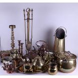 A large lot of various copperware including candlesticks and kettles.