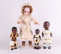 Schildkröt, a lot of 3 Dark colored dolls in plastic. Circa 1950. Including a doll with a porcelain 