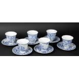 A set of six porcelain high model cups and saucers with landscape/ship decor marked with 6 character