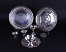 A lot of various white metal objects consisting of dishes and bowls. India, 20th century.