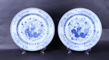 Two porcelain dishes decorated with flower vase-on-leaf decor, and sword decor, with rich floral dec