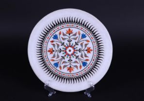 A marble (inlay) dish with polychrome decor.
