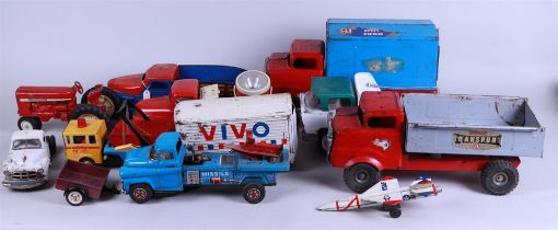 A large vintage tin toy cars.