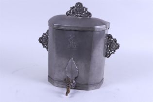 A pewter Louis Seize wall fountain, dated 1789.