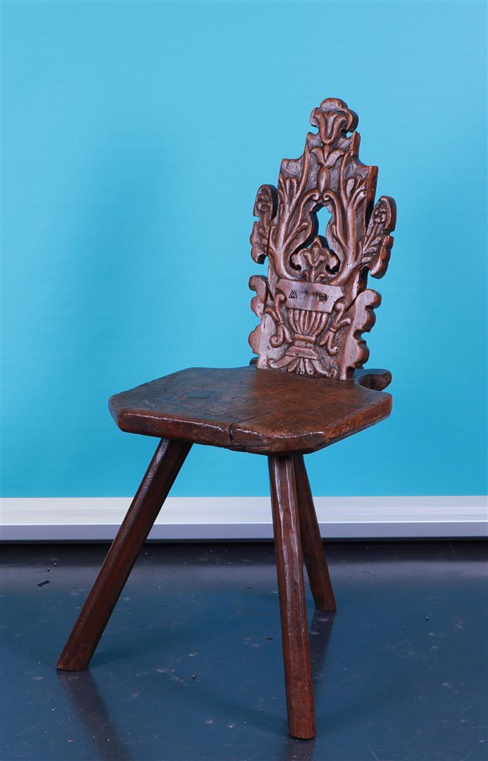 A Dutch/German farm chair with carved backrest. 