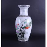 A large porcelain vase in Famile Rose decor with peacocks and flowers. China, 20th century.
