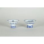 Two porcelain tazzas with floral decor (1x with ownership mark on the bottom) China, 19th century.
