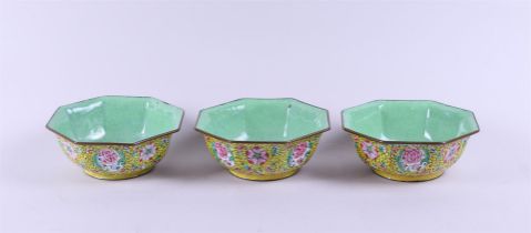 A set of three enamel bowls with floral decor. China, 20th century.