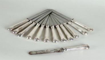 A lot consisting of (13) 19th century knives with silver handles. 19th century.