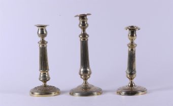 A lot consisting of (3) bronze early 19th century (Empire) candlesticks.
