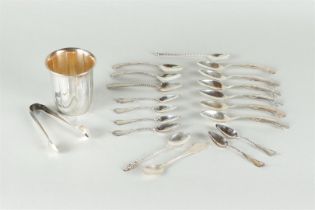 A silver spoon vase, assorted silver spoons and a lump tongs