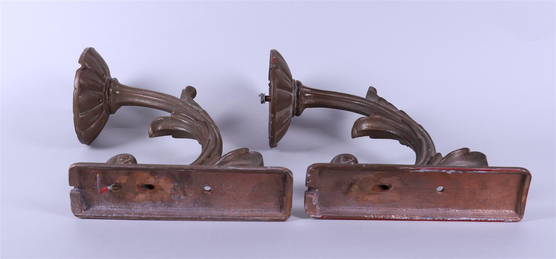 A pair of brass wall fixtures, ca. 1900.
 - Image 3 of 3