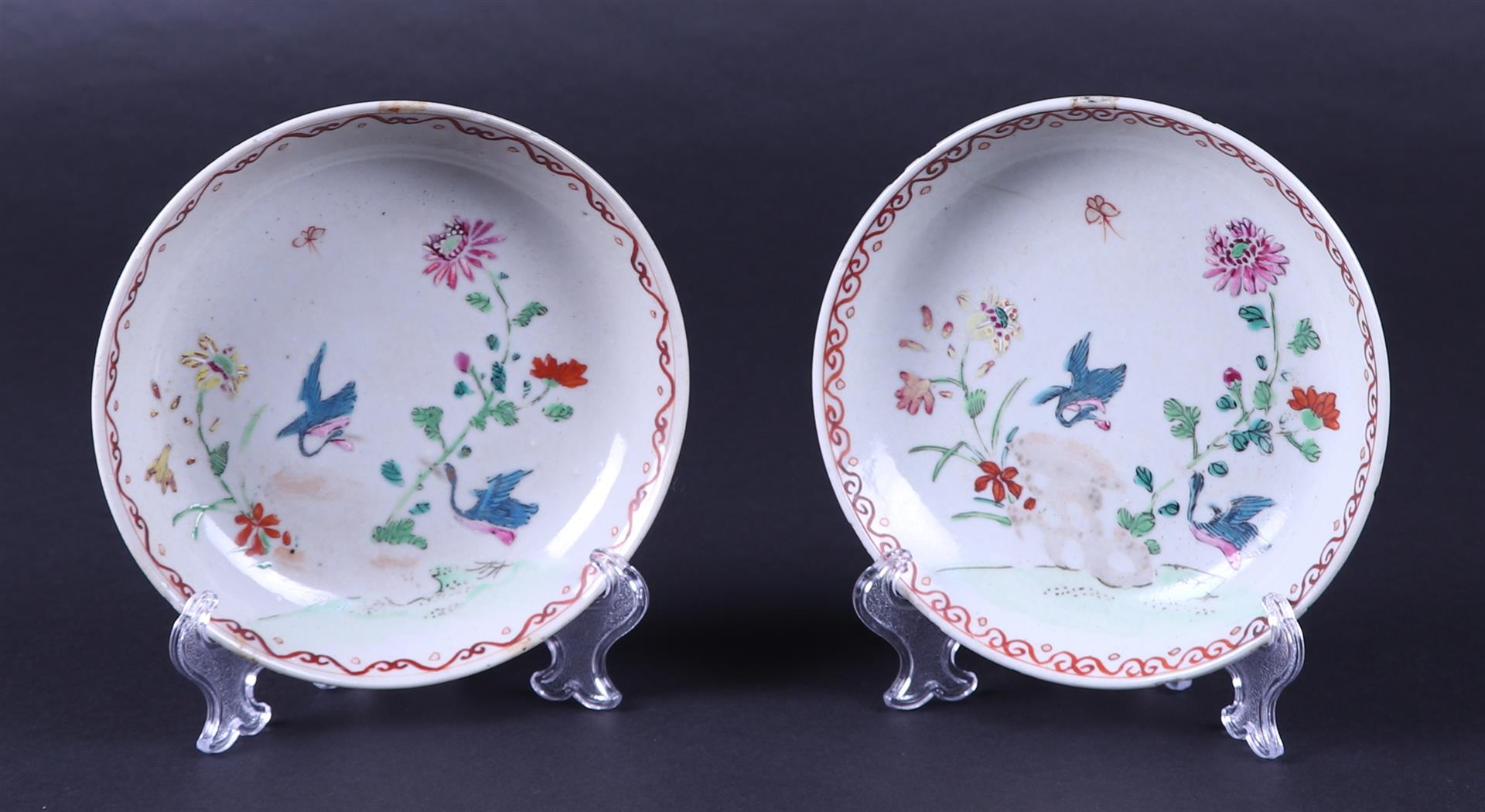 A set of two famille rose dishes with a decor of birds and flowers. China, 18th century.
