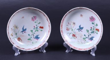A set of two famille rose dishes with a decor of birds and flowers. China, 18th century.
