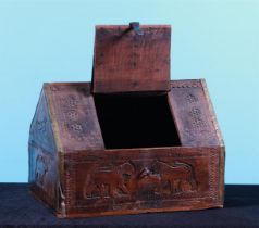 A softwood valuables box with carvings and copper fittings and three drawers with secret locks