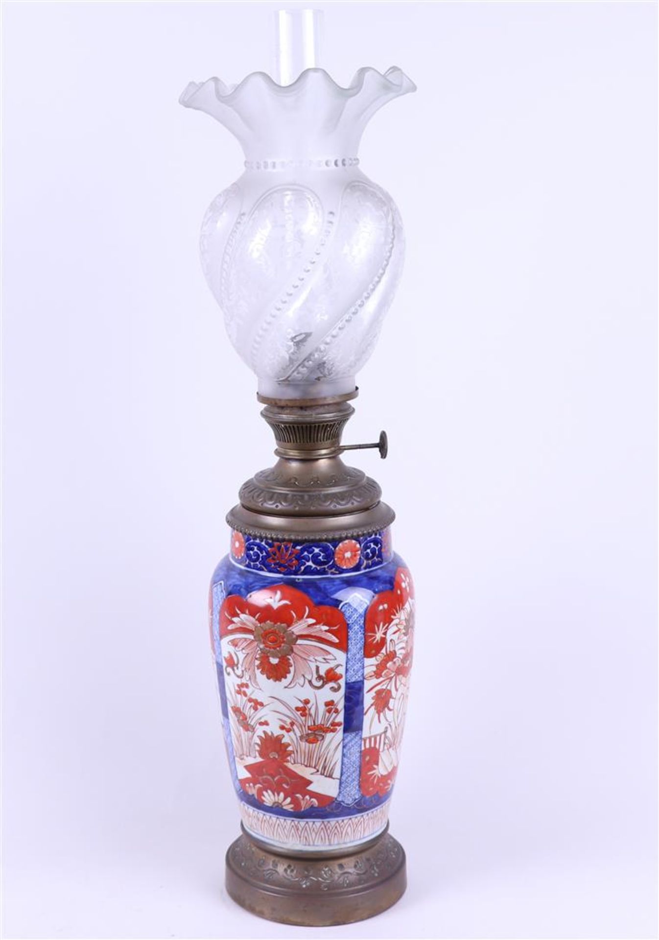 An Imari oil lamp in a copper frame. Japan, 19th century