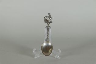 A silver birth spoon. Marked in the box and annotated 'Cembureau 84'.
