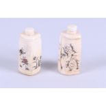 A lot of two bone snuff bottles decorated with beetles. China, 20th century.
