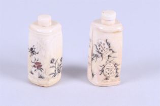 A lot of two bone snuff bottles decorated with beetles. China, 20th century.