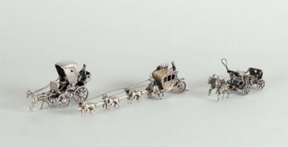 A lot of miniature silver consisting of a model of a royal carriage pulled by six horses, a beer car