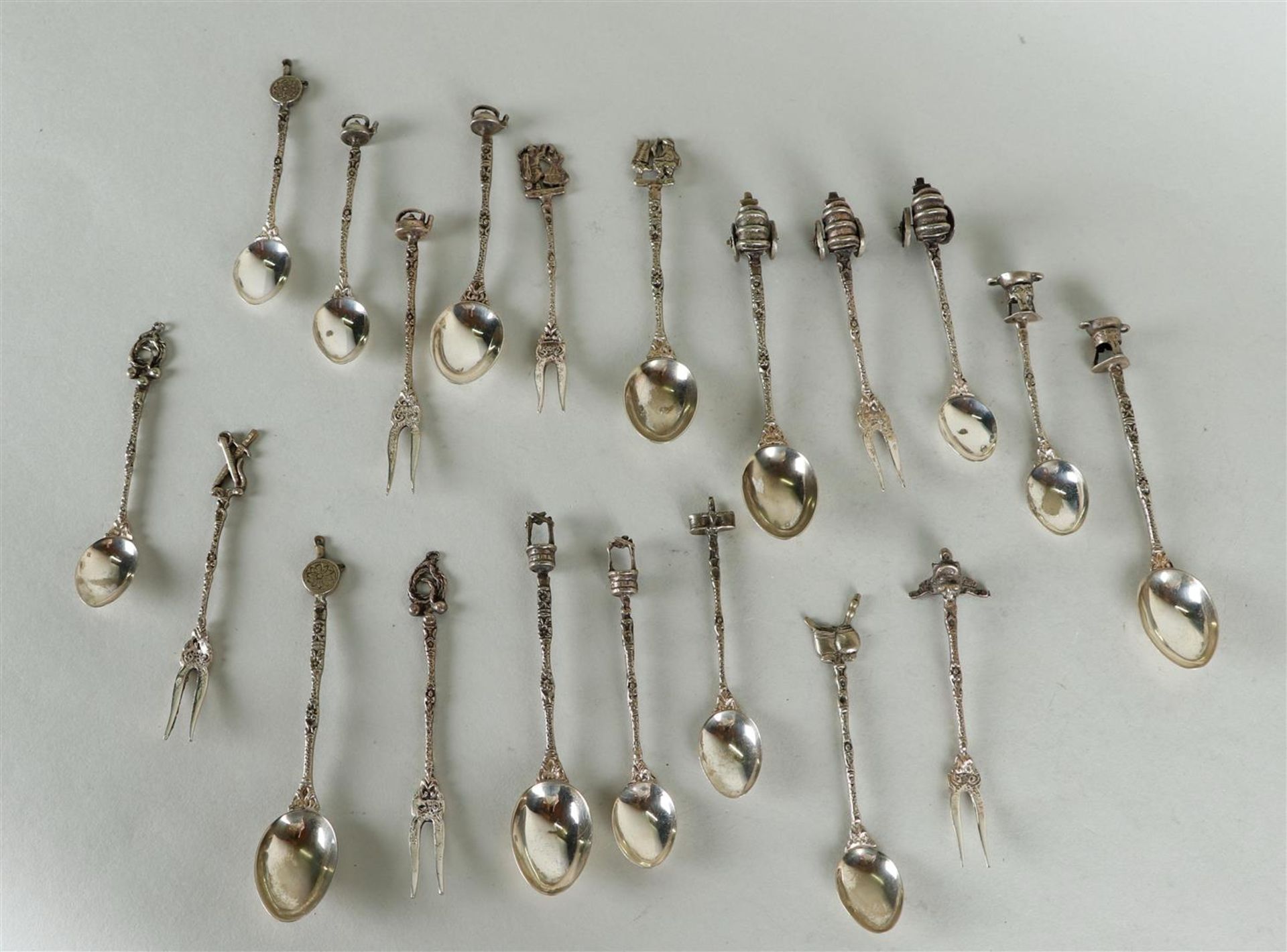 A large lot of (20) silver forks and spoons with wells, covered wagons, teapots etc. - Image 2 of 3