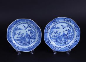 A set of blue and white plates with a decor of frames in a garden. China, Yongzheng.