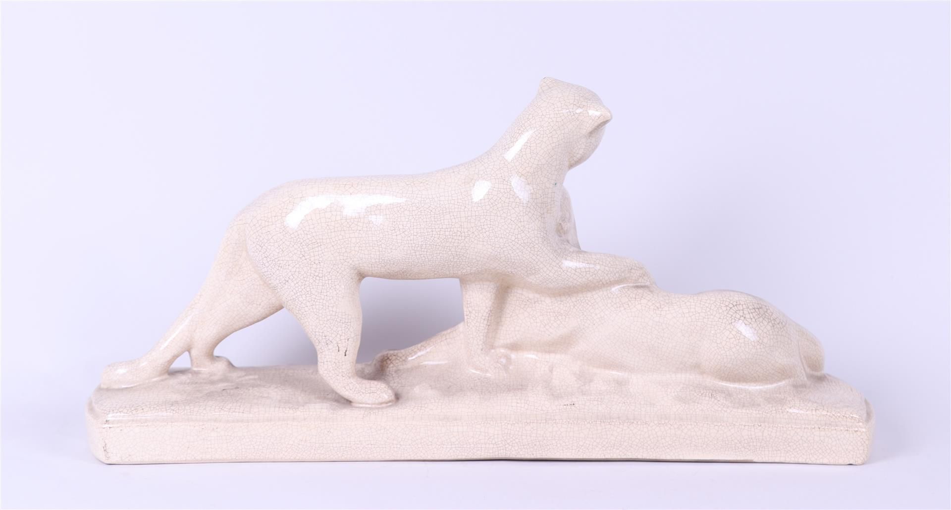 Louis Fontinelle (1864-1964), a stylized crackle Art Deco sculpture of two panthers.
 - Image 4 of 6