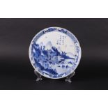A porcelain dish with landscape decor and decorated with various Chinese characters. China, 19th cen