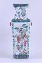 A family rose baluster vase with decor of various figures. China, 19th century.