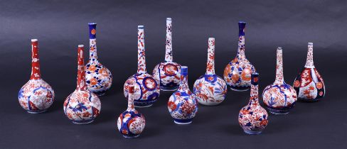 A lot of twelve Imari pipe vases. Japan, 19th century.