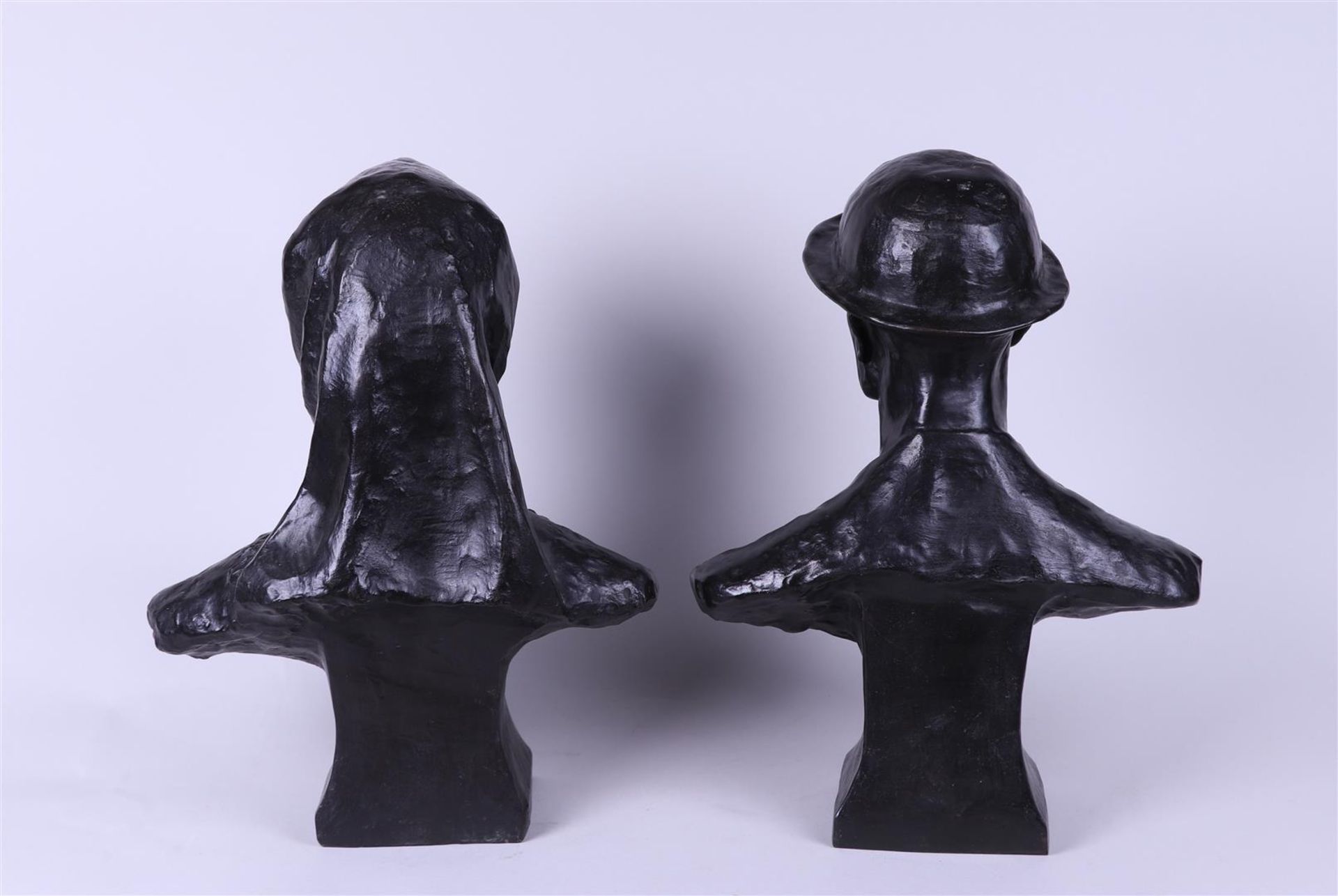 A set of (2) dark patinated bronze busts of a dome and his wife.  - Image 6 of 6