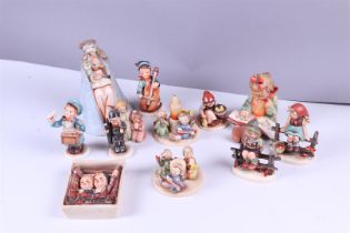 MI. Hummel, a lot of (12) figurines, all marked Goebel.