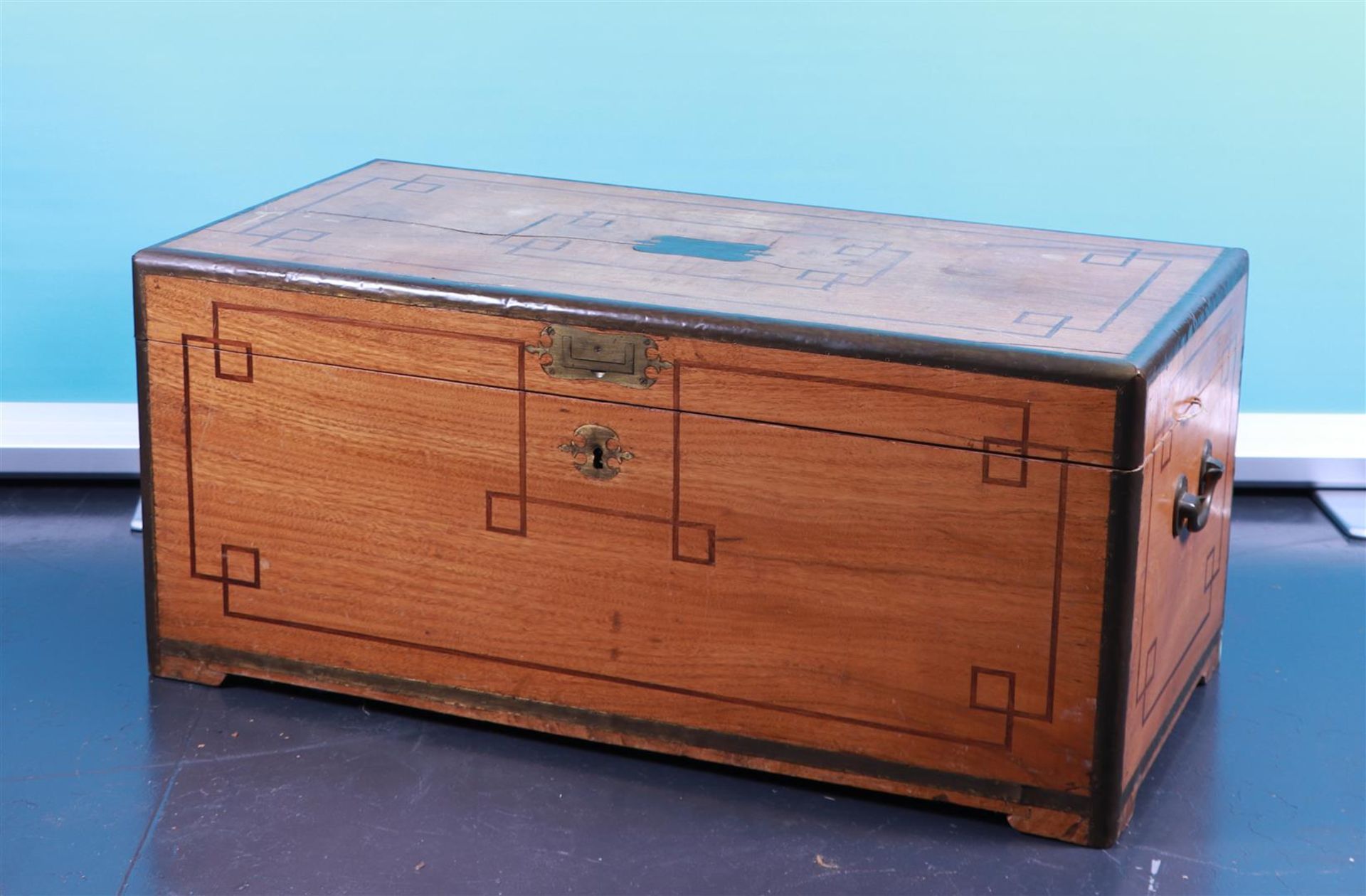 A colonial camphor chest with copper fittings and two inner chests, 19th century.
