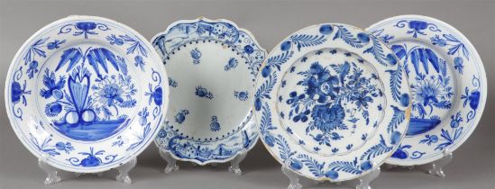 A lot of four earthenware plates with various decors. 