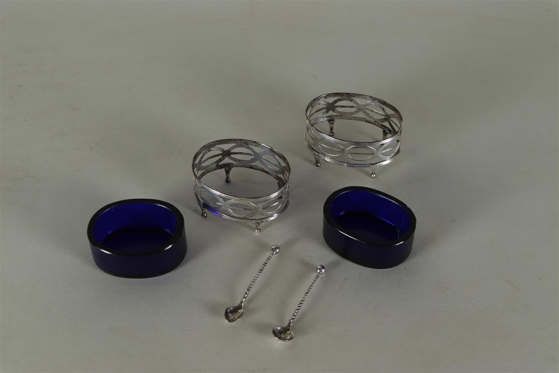 A set of (2) silver Louis XVI salt cellars with blue glass and matching spoons.  - Image 3 of 4