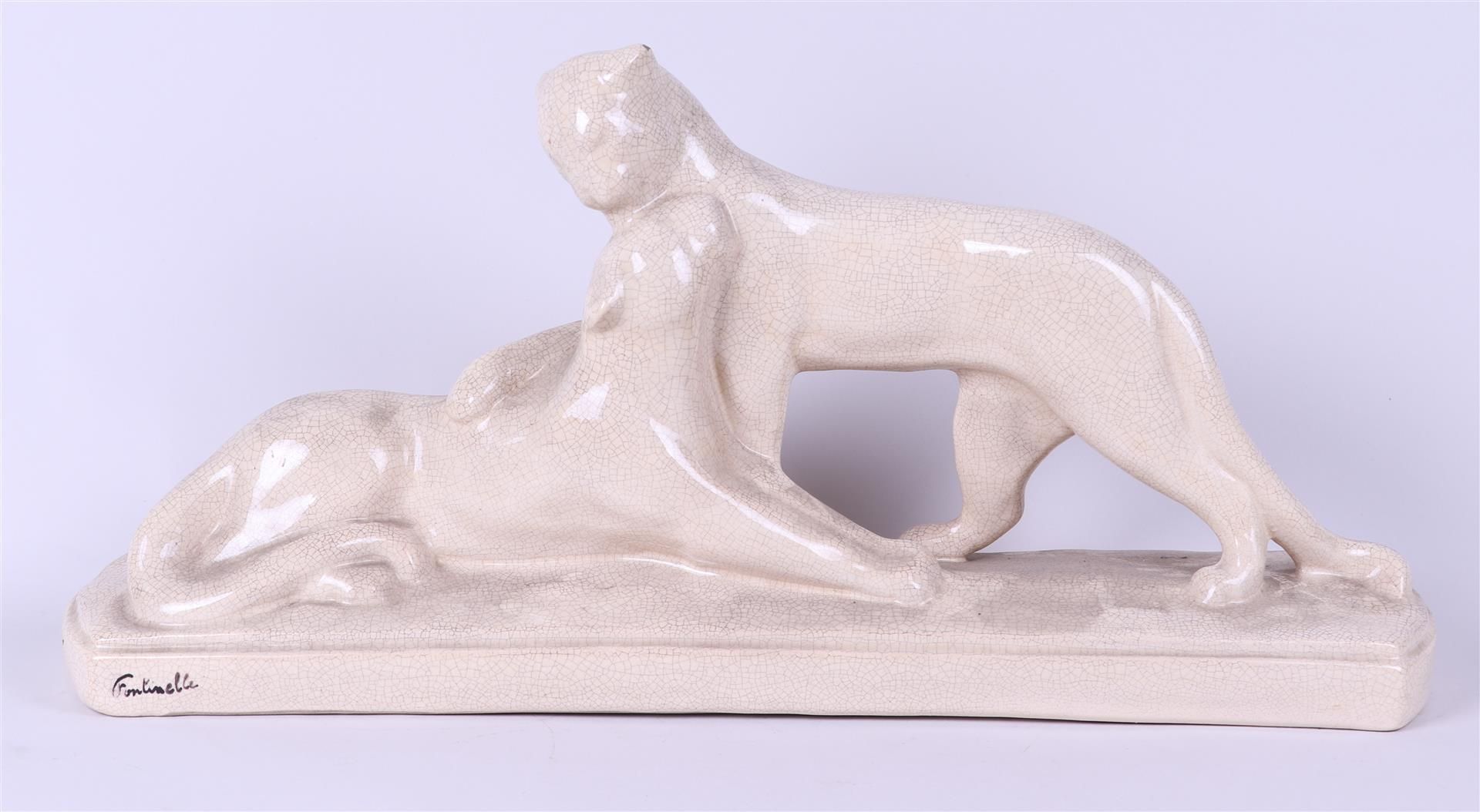 Louis Fontinelle (1864-1964), a stylized crackle Art Deco sculpture of two panthers.
